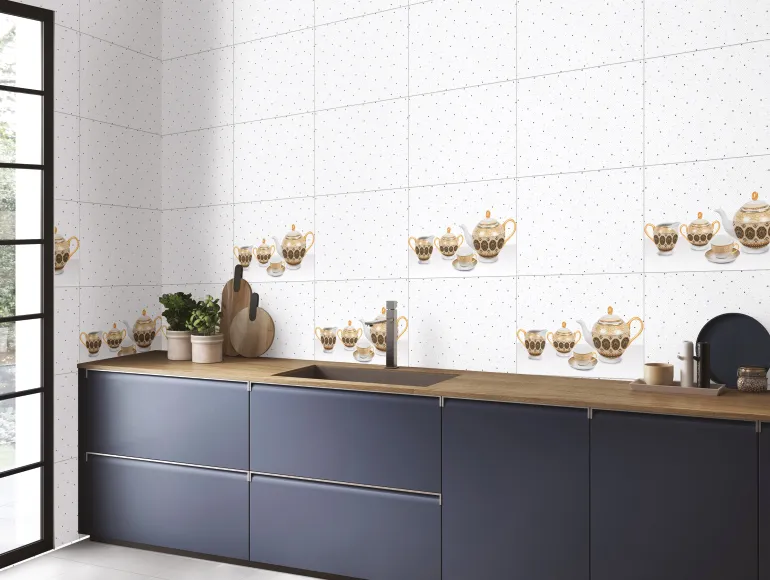 Modern White kitchen interior design with a backsplash featuring white tiles with a dotted pattern.